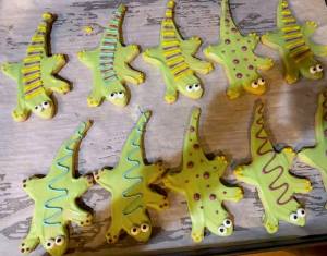 Photo of lizard shaped and colored sugar cookies